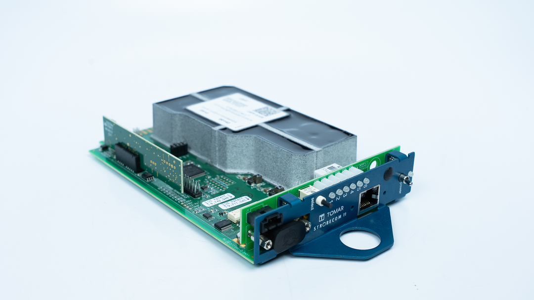 TOMAR 4140V2 Series Strobecom® II optical signal processor card with the Ethernet port visible